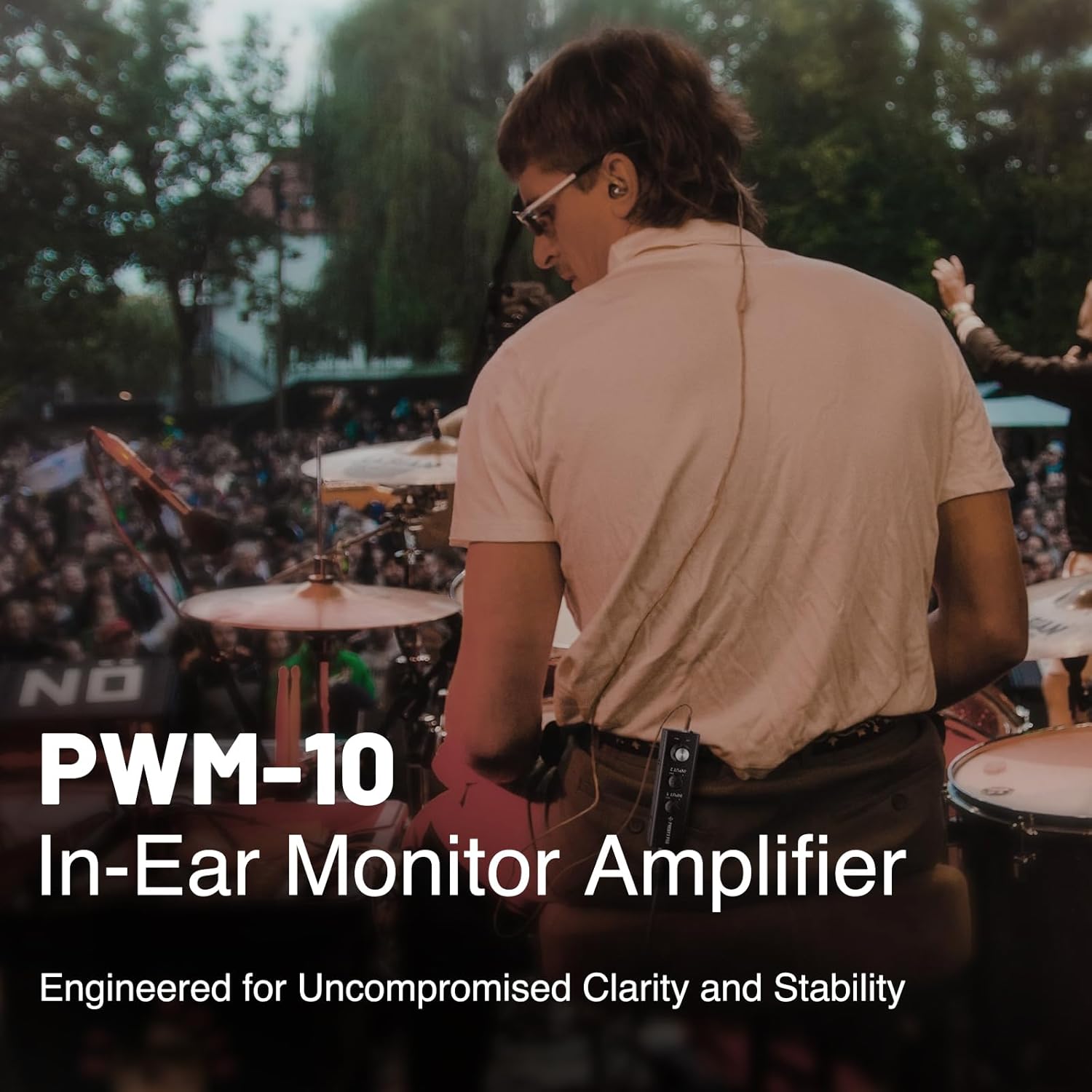 Phenyx Pro in-ear monitor amplifier with connected cable and control knobs
