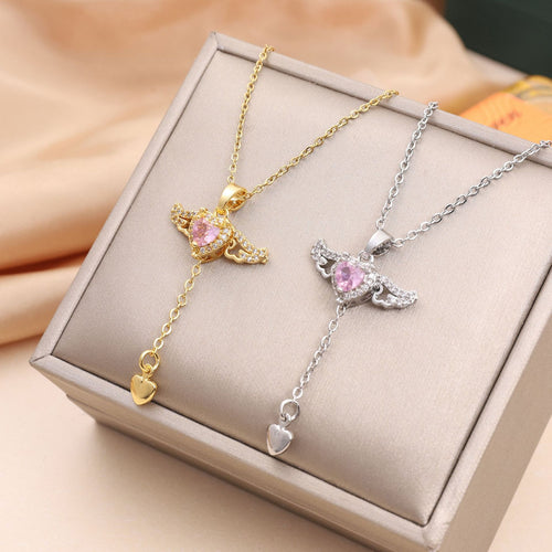 Angel wing heart necklace with crystal charms on a short link chain, in gold/silver tones
