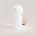 White cylindrical container with a rounded top